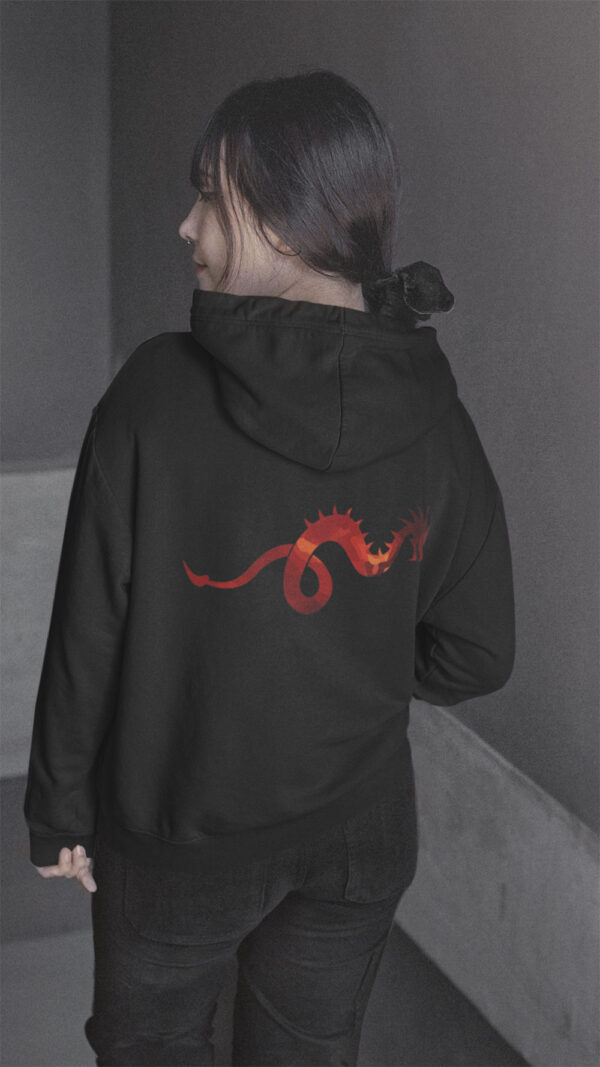 woman in black hoodie with dragon art