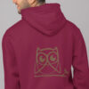 woman in red hoodie with brown owl art