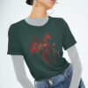 woman in green shirt with red dragon art