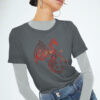 woman in grey shirt with red dragon art
