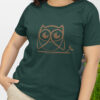 woman in green shirt with brown owl art