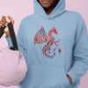 woman in blue hoodie with red dragon art