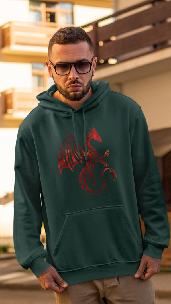 man in green hoodie with red dragon art