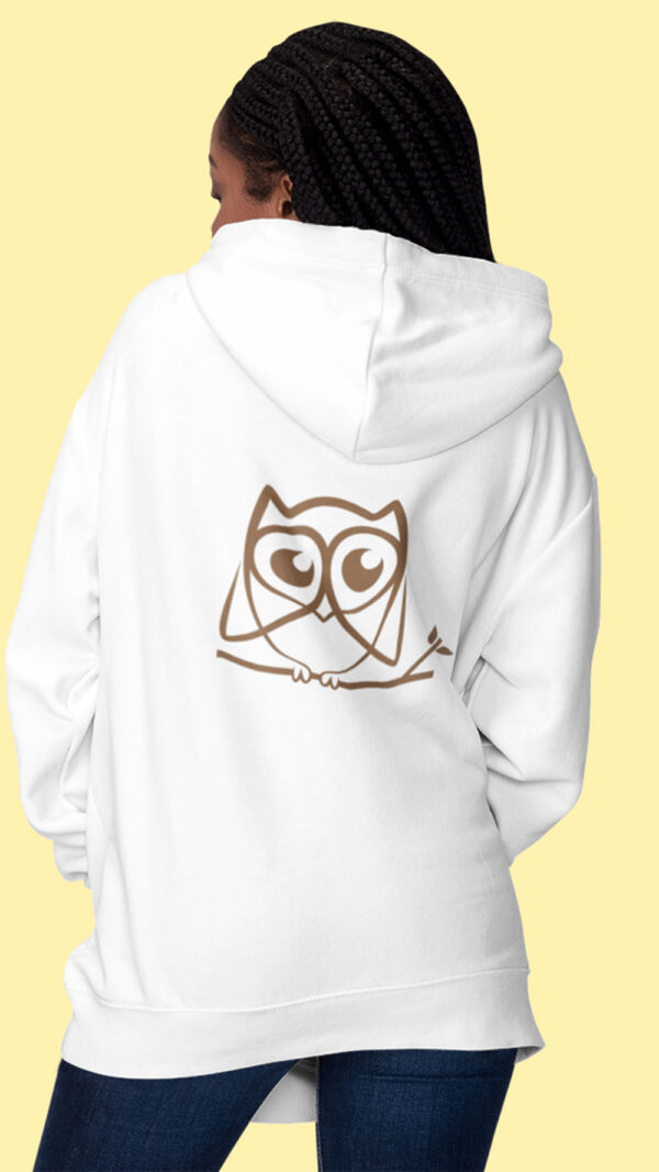 woman in white hoodie with brown owl art