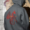 man in black hoodie with red dragon art