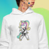 man wearing white hoodie with karate unicorn art and stickers on his face
