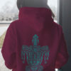 woman in red hoodie with green turtle art