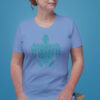 woman in blue shirt with green turtle art
