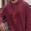 man in red hoodie with red dragon art