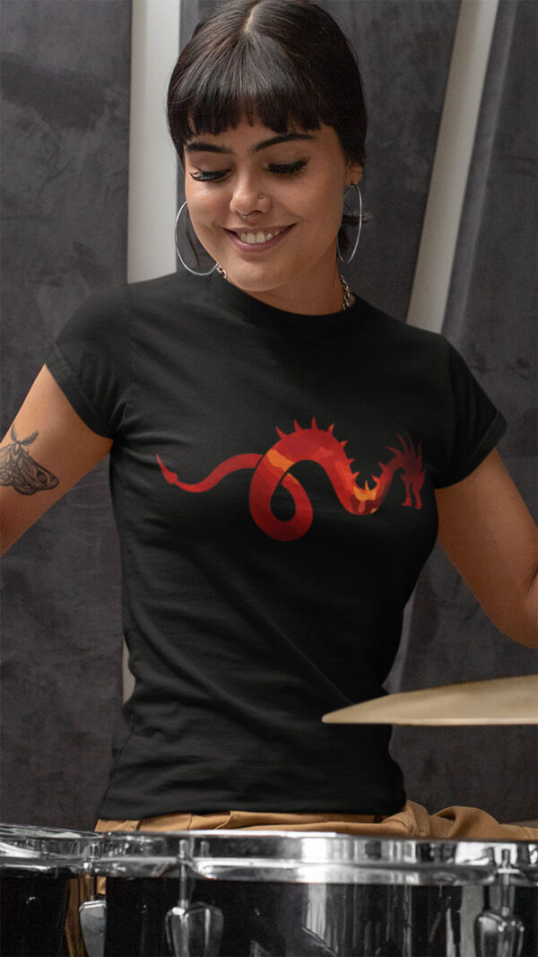 woman in black shirt with dragon art playing drums