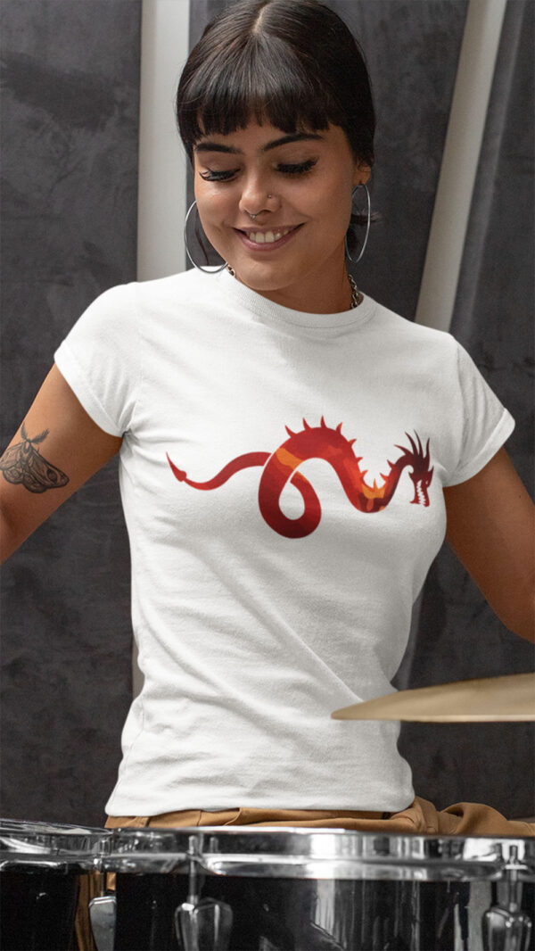 woman in white shirt with dragon art playing drums