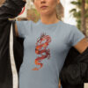 woman in blue shirt with red dragon art