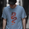 man in blue shirt with red dragon art