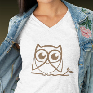 woman in white shirt with brown owl art