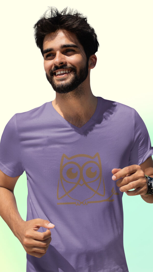 man in purple shirt with brown owl art