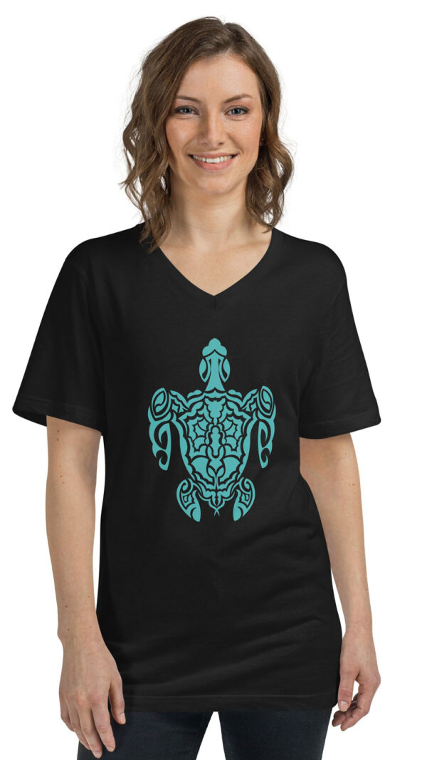 woman in black shirt with green turtle art