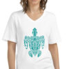 woman in white shirt with green turtle art