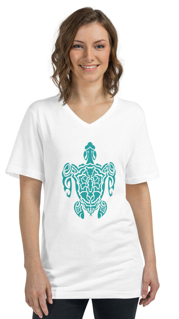 woman in white shirt with green turtle art