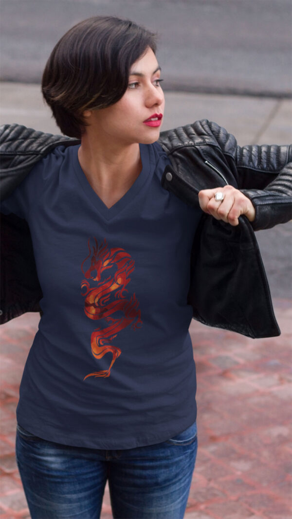 woman in blue shirt with red dragon art