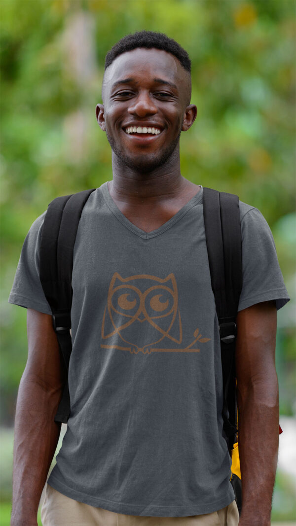 man in grey shirt with brown owl art