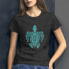 woman in grey shirt with green turtle art