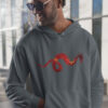 red dragon art on gray hoodie on person