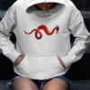 red dragon art on white hoodie on person