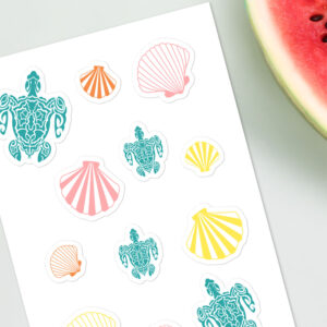 Ocean life stickers on paper next to watermelon