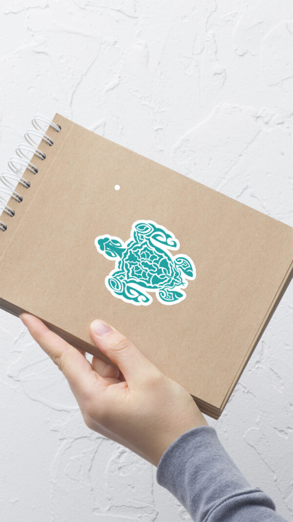 Turtle sticker on notepad